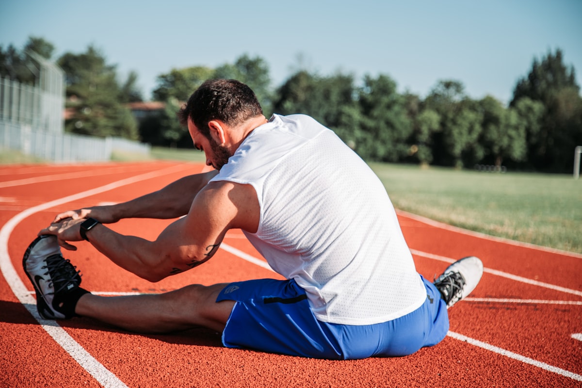 Person building healthy joint care habits with morning stretching routine